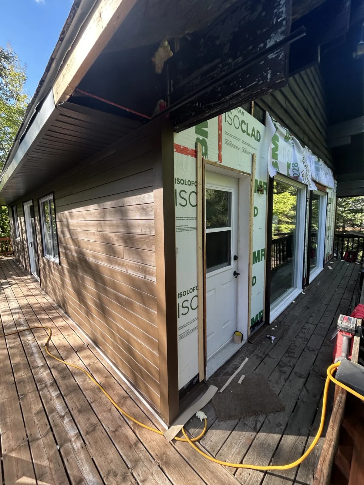 Installing Atka pine cladding in Macchiato